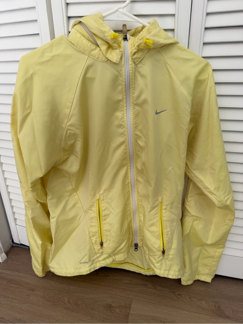 Nike Women’s Light Yellow Hooded Windbreaker Jacket